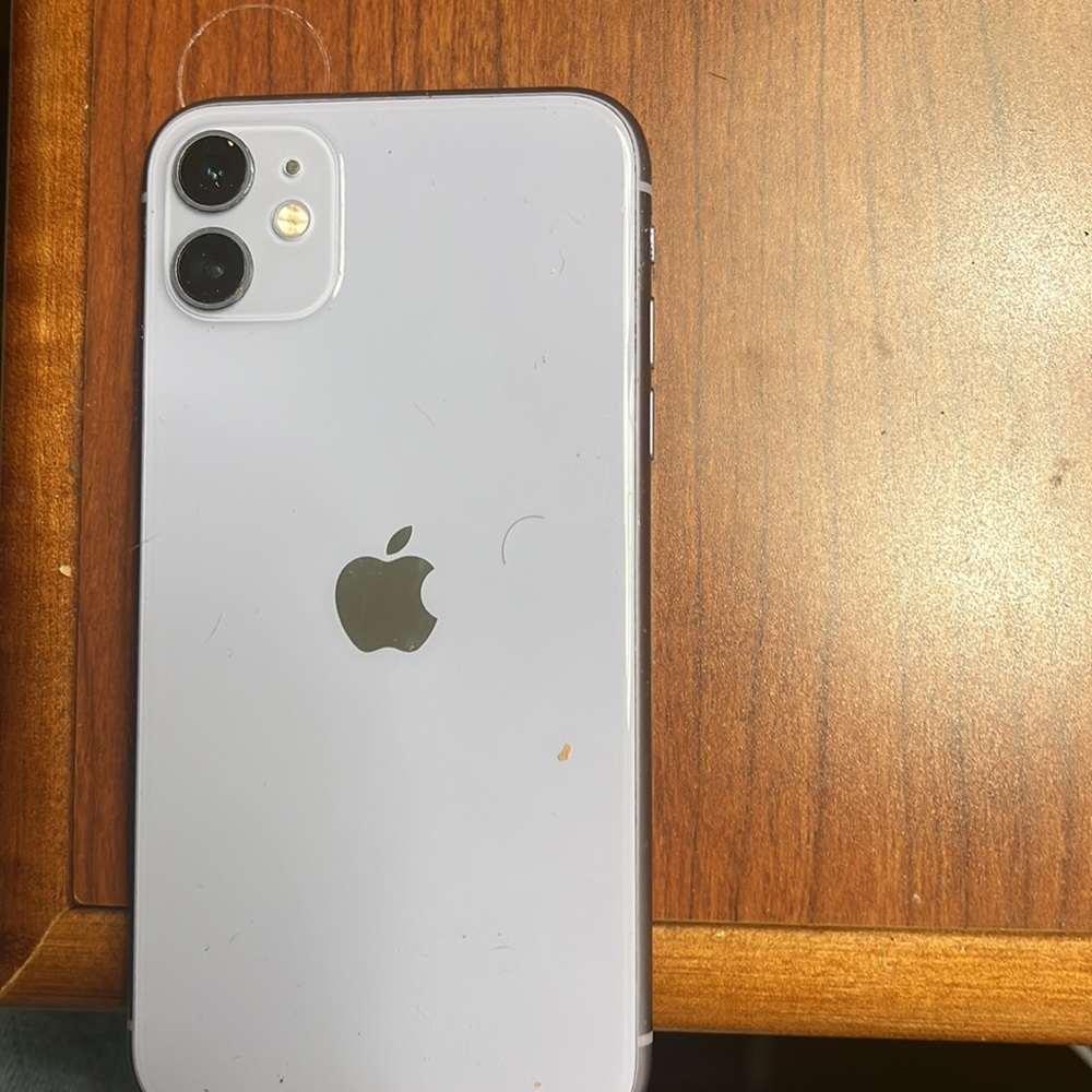 It’s a silver iPhone 11. Like brand new. Always kept in a case - Picture 2 of 2